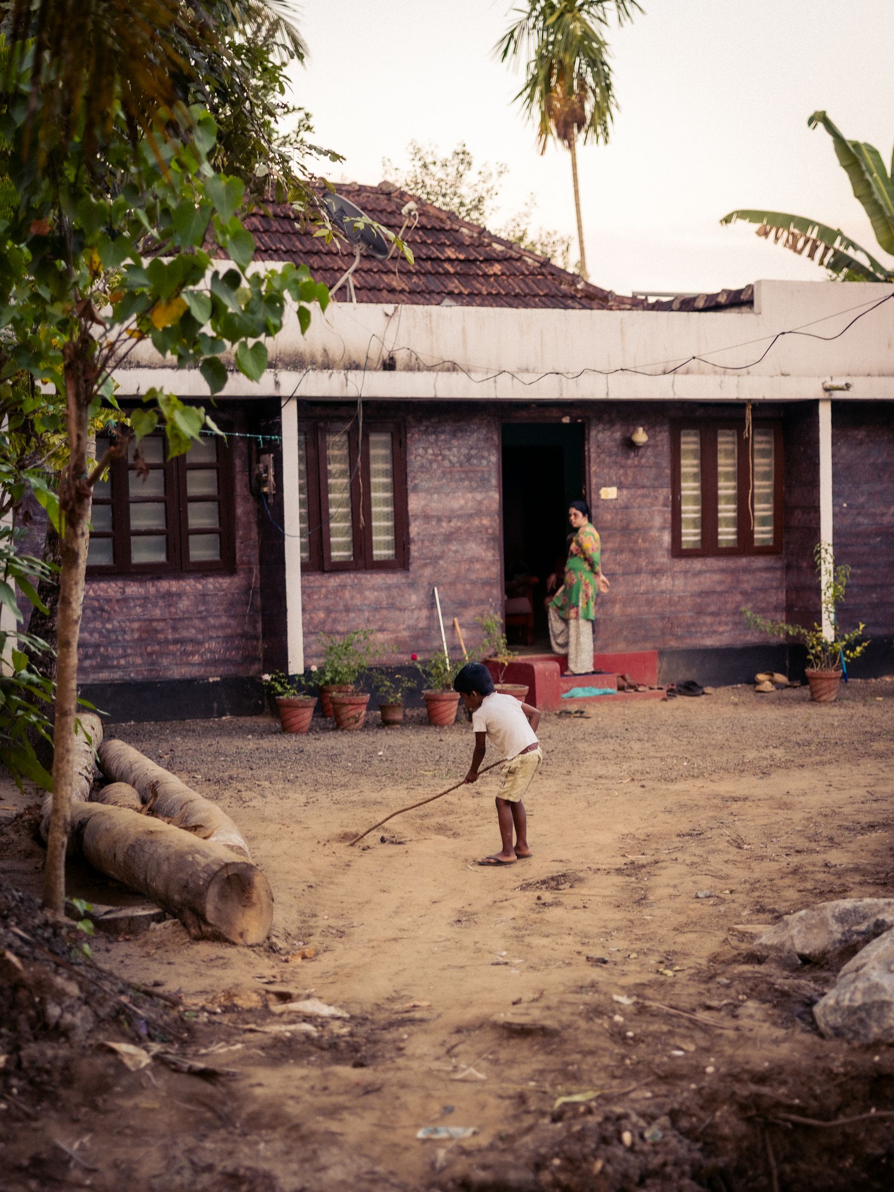 Rural Kerala House And Child